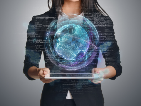 Woman holding tablet with cloud graphics